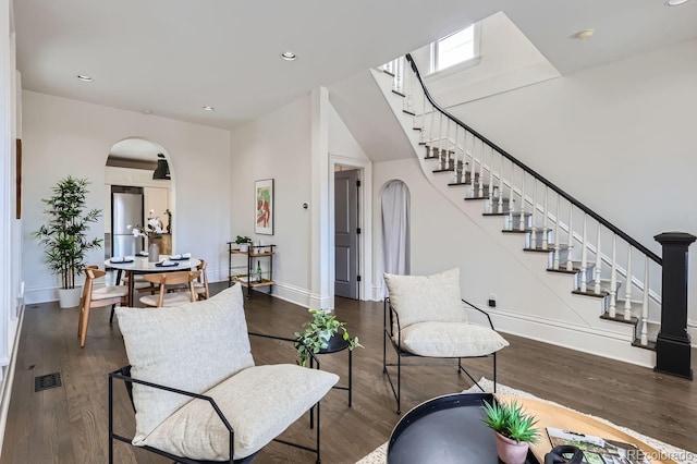 sitting room featuring dark hardwood / wood-style flooring