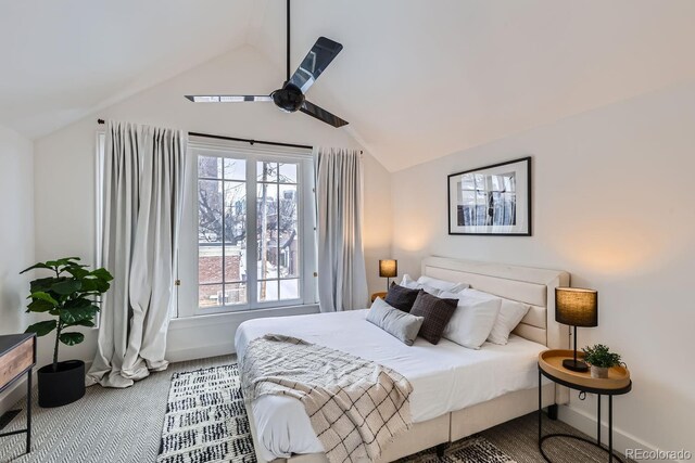 carpeted bedroom with lofted ceiling and ceiling fan