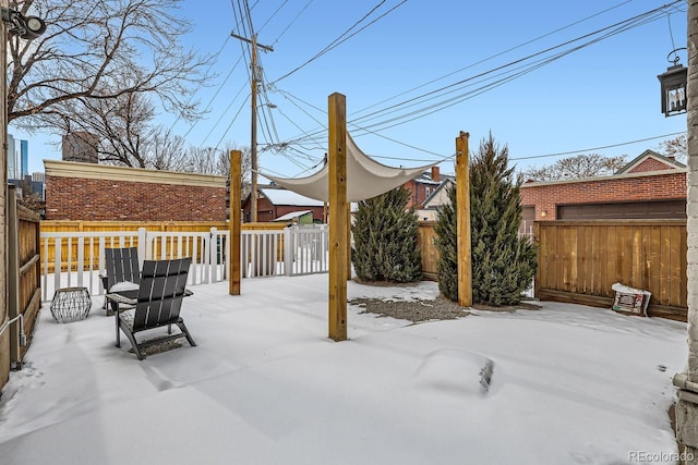 view of snow covered patio