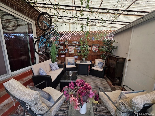 604 S Xenon Ct, Lakewood, CO 80228 - view of patio with an outdoor living space and a wooden deck