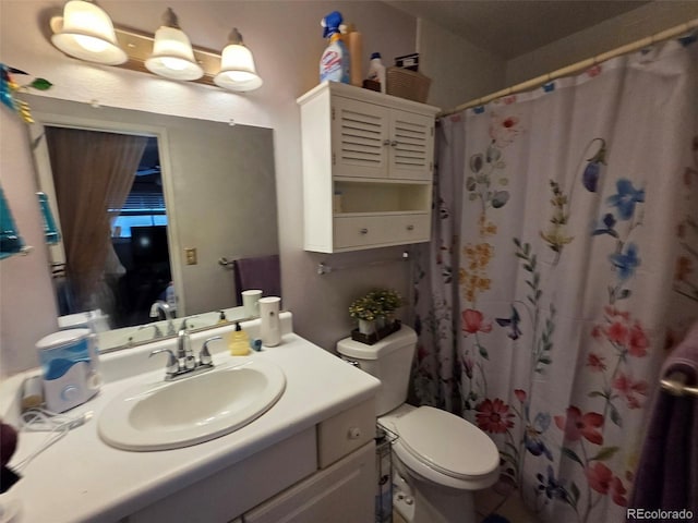 604 S Xenon Ct, Lakewood, CO 80228 - bathroom featuring vanity and a shower with curtain
