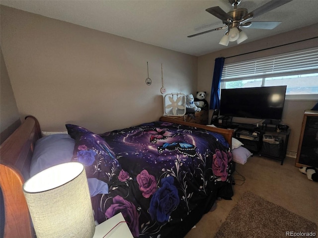 604 S Xenon Ct, Lakewood, CO 80228 - carpeted bedroom featuring a ceiling fan