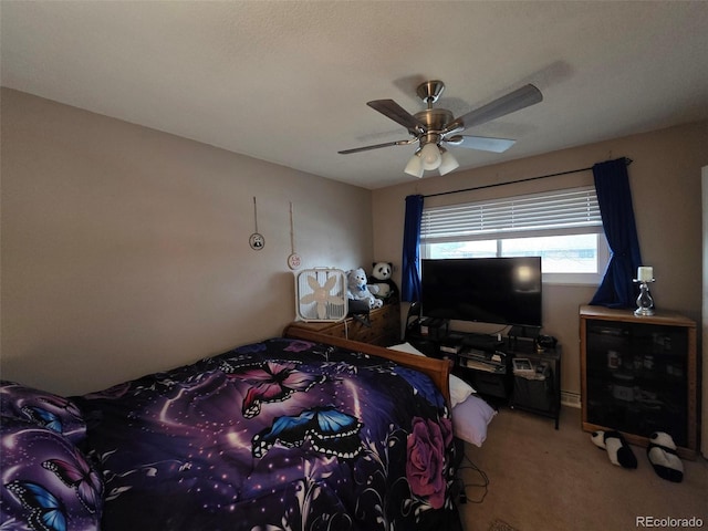 604 S Xenon Ct, Lakewood, CO 80228 - carpeted bedroom with a ceiling fan