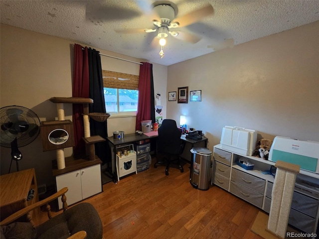 604 S Xenon Ct, Lakewood, CO 80228 - home office with a ceiling fan, wood finished floors, and a textured ceiling
