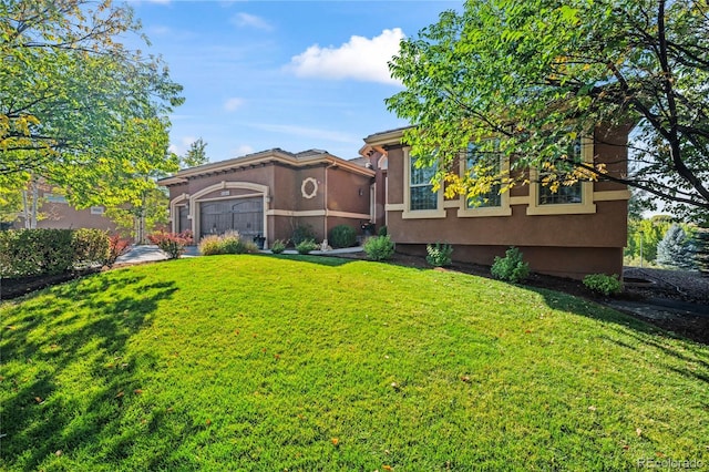 12477 Creekhurst Dr, Colorado Springs, CO 80921 - view of green lawn featuring a garage