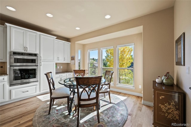 12477 Creekhurst Dr, Colorado Springs, CO 80921 - dining space featuring light wood-style flooring, recessed lighting, and baseboards