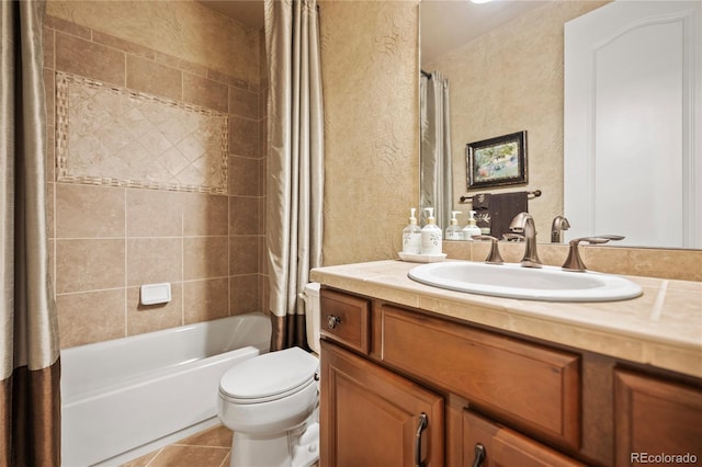 12477 Creekhurst Dr, Colorado Springs, CO 80921 - bathroom with a textured wall, tile patterned flooring, toilet, vanity, and shower / bath combo