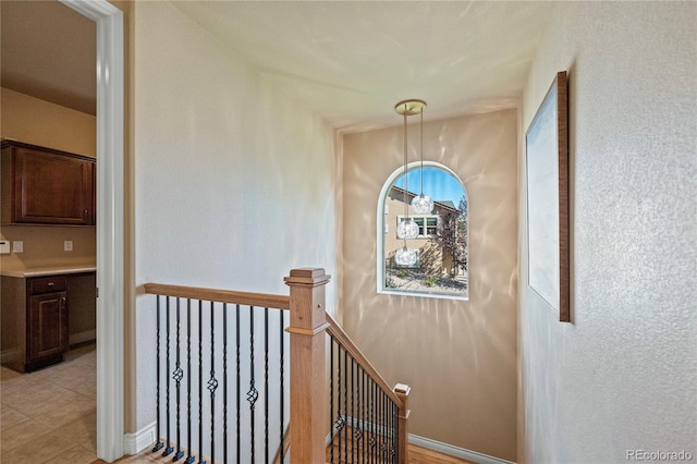 12477 Creekhurst Dr, Colorado Springs, CO 80921 - corridor featuring an upstairs landing