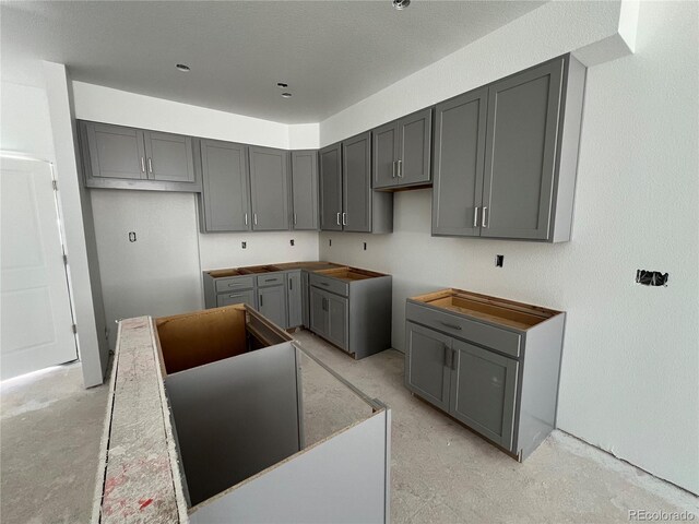 kitchen featuring gray cabinetry