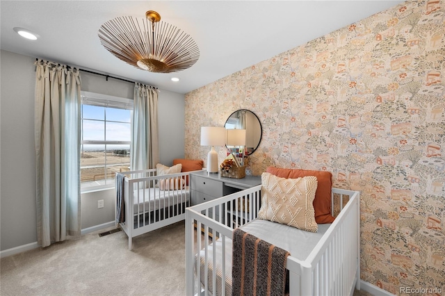 bedroom with carpet, wallpapered walls, visible vents, baseboards, and recessed lighting
