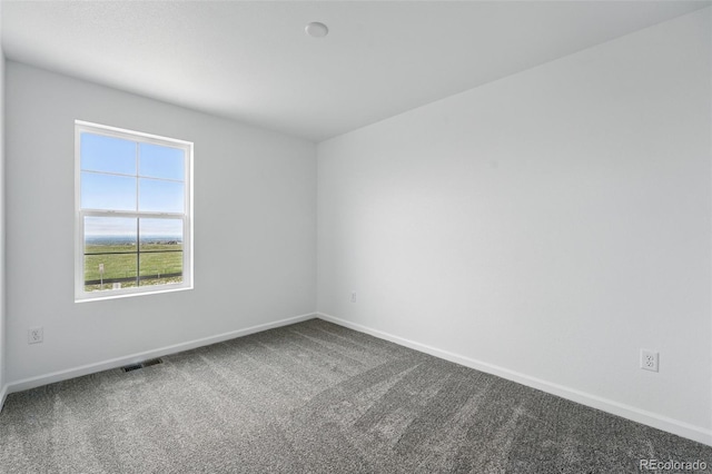 17115 W 91st Ln, Arvada, CO 80007 - carpeted empty room featuring baseboards