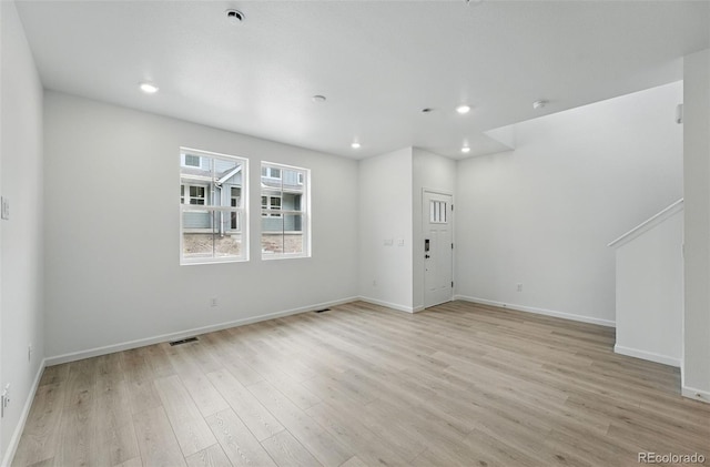 17115 W 91st Ln, Arvada, CO 80007 - unfurnished room featuring light wood-style flooring, recessed lighting, and baseboards