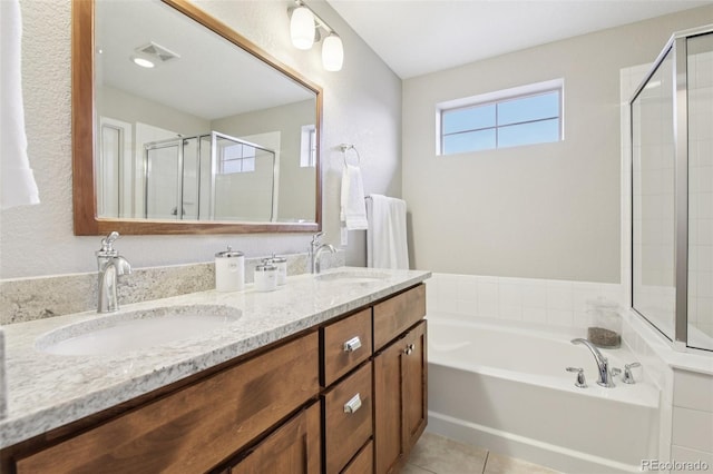 3240 Spruce St, Denver, CO 80238 - bathroom featuring double vanity, a bath, a shower stall, and tile patterned flooring