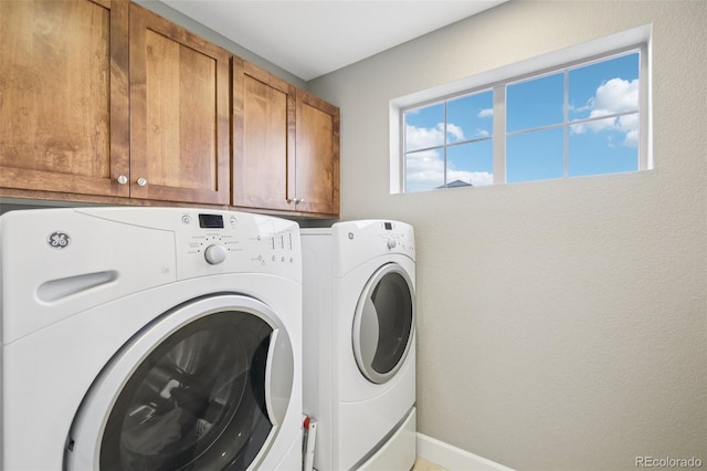 3240 Spruce St, Denver, CO 80238 - laundry room featuring washing machine and clothes dryer and cabinet space