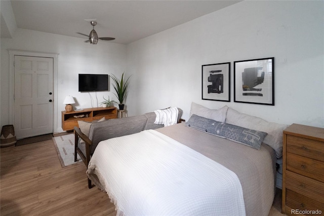bedroom featuring ceiling fan and light wood-style flooring