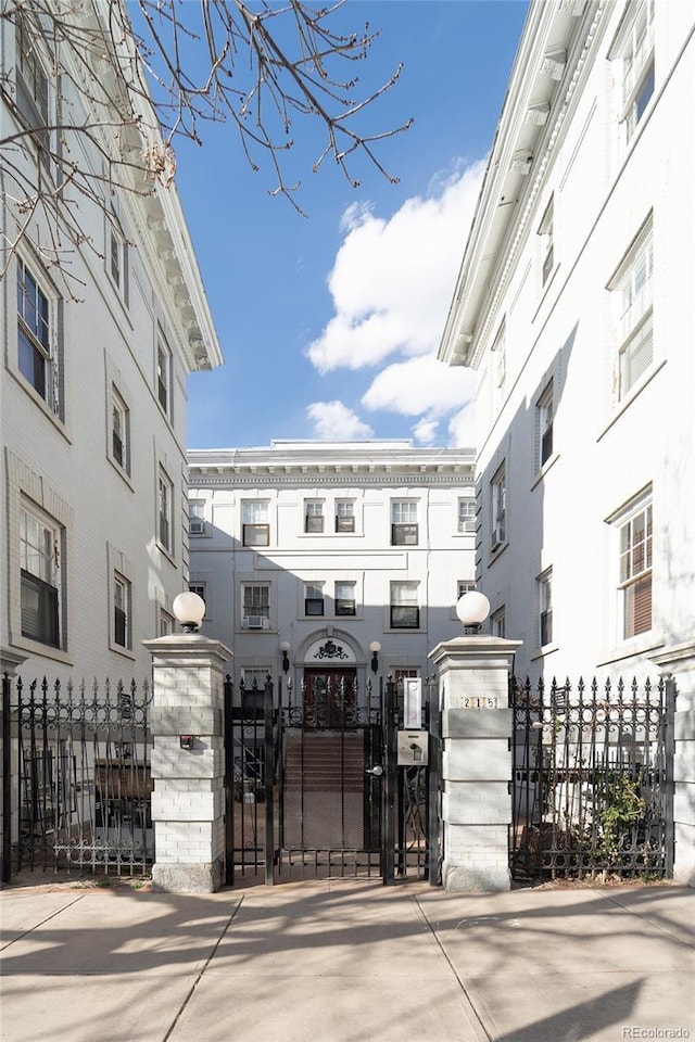 exterior space featuring a gate and fence