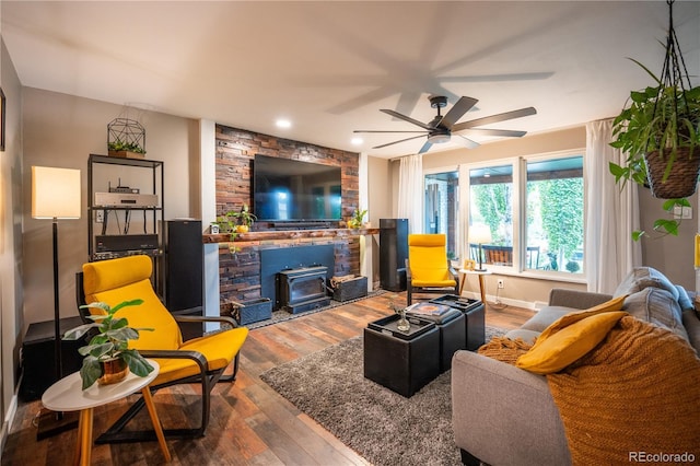 3125 Xenon St, Wheat Ridge, CO 80215 - living room with ceiling fan, wood-type flooring, a wood stove, and recessed lighting
