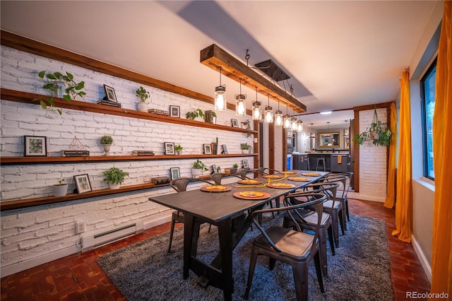 3125 Xenon St, Wheat Ridge, CO 80215 - dining room featuring brick wall, a baseboard radiator, brick flooring, and baseboards