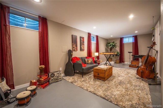 3125 Xenon St, Wheat Ridge, CO 80215 - living room with recessed lighting, finished concrete floors, and baseboards