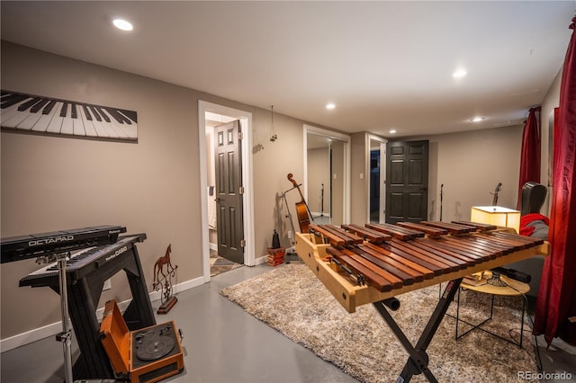 3125 Xenon St, Wheat Ridge, CO 80215 - dining area featuring finished concrete flooring, baseboards, and recessed lighting