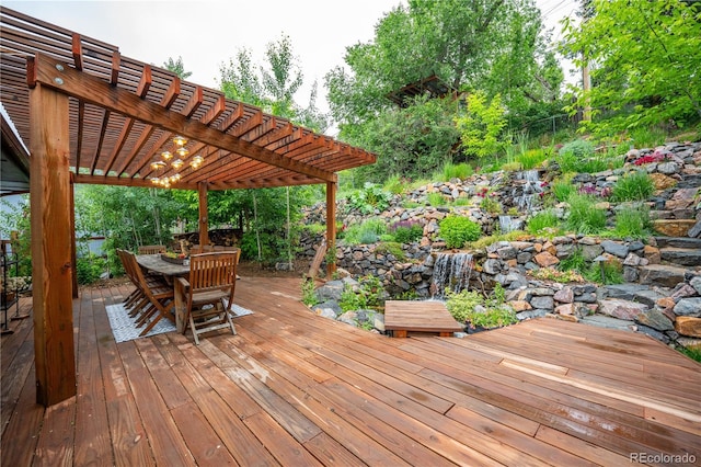 3125 Xenon St, Wheat Ridge, CO 80215 - wooden deck featuring a pergola and outdoor dining area
