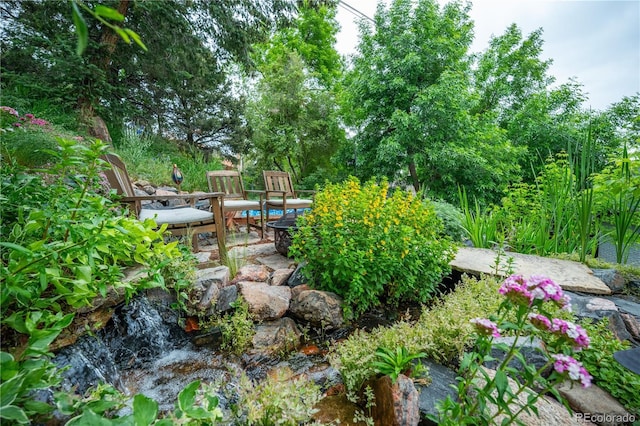3125 Xenon St, Wheat Ridge, CO 80215 - view of yard featuring an outdoor fire pit