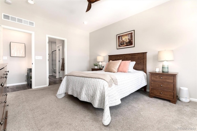 bedroom featuring ceiling fan and carpet