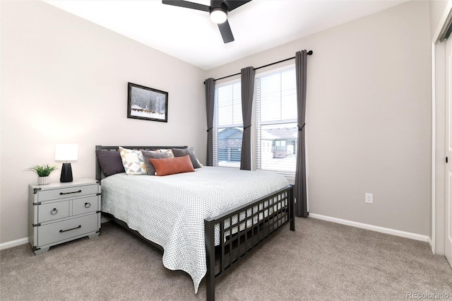 bedroom with light carpet and ceiling fan