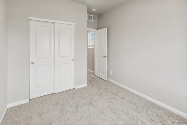 941 Sarah Ave, Fort Lupton, CO 80621 - unfurnished bedroom featuring carpet, baseboards, and a closet