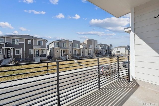 balcony featuring a residential view