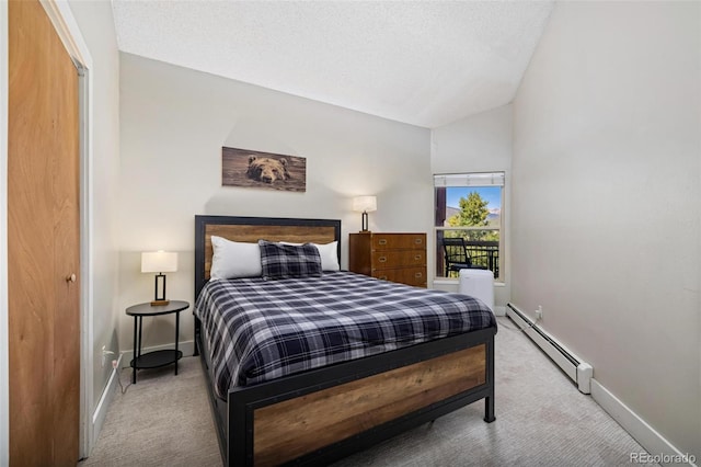 2449 Ryan Gulch Ct Unit 2449, Silverthorne, CO 80498 - bedroom with a baseboard radiator, carpet, and high vaulted ceiling