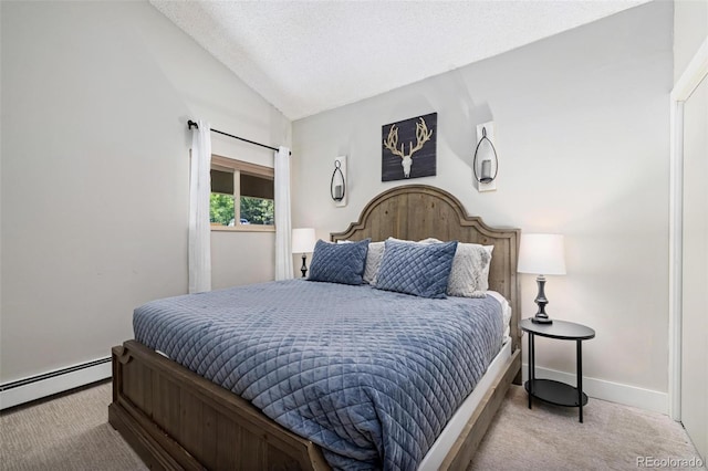 2449 Ryan Gulch Ct Unit 2449, Silverthorne, CO 80498 - carpeted bedroom with vaulted ceiling, a baseboard heating unit, and a textured ceiling