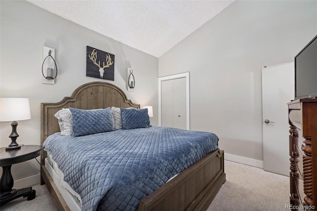 2449 Ryan Gulch Ct Unit 2449, Silverthorne, CO 80498 - bedroom with carpet and lofted ceiling