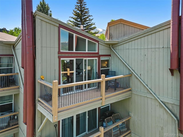 2449 Ryan Gulch Ct Unit 2449, Silverthorne, CO 80498 - back of house featuring a balcony