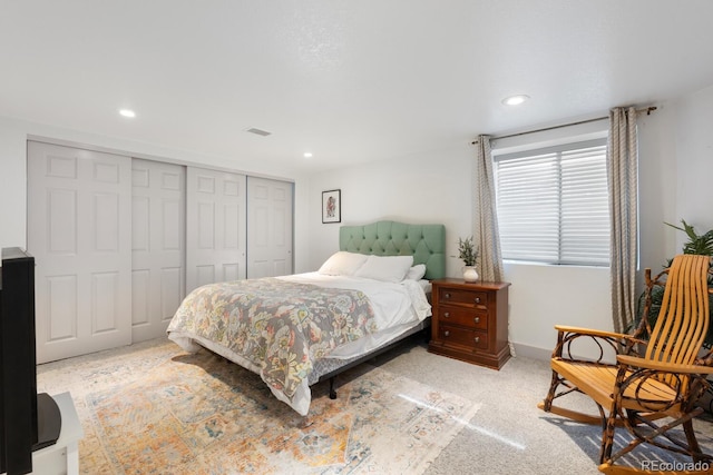 561 Cook St, Denver, CO 80206 - carpeted bedroom with a closet, recessed lighting, and baseboards