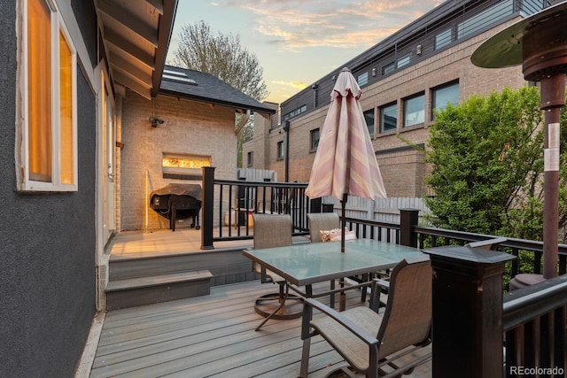 561 Cook St, Denver, CO 80206 - deck at dusk with outdoor dining area
