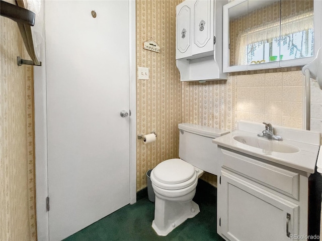 6236 Ingalls Ct, Arvada, CO 80003 - bathroom featuring vanity and wallpapered walls