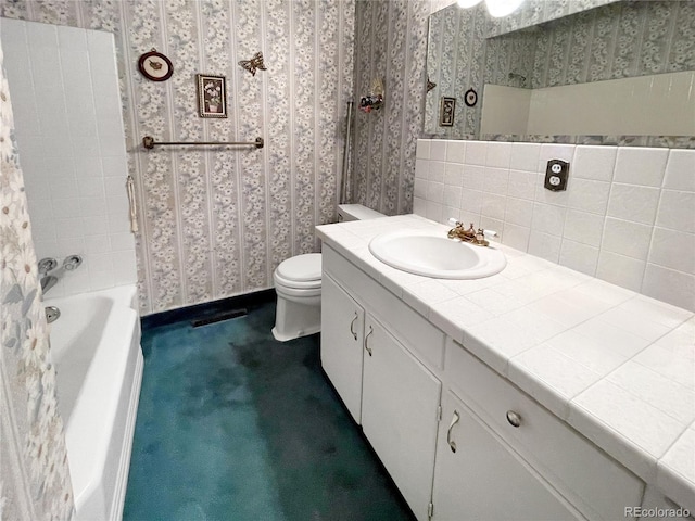 6236 Ingalls Ct, Arvada, CO 80003 - bathroom featuring wallpapered walls, vanity, and backsplash