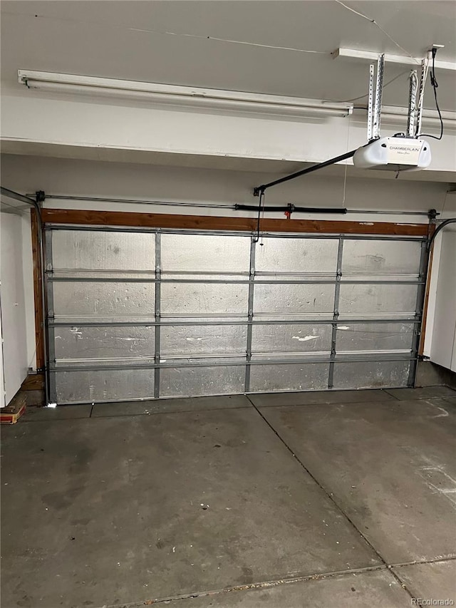 garage featuring a garage door opener