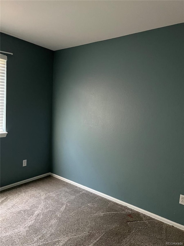 view of carpeted spare room