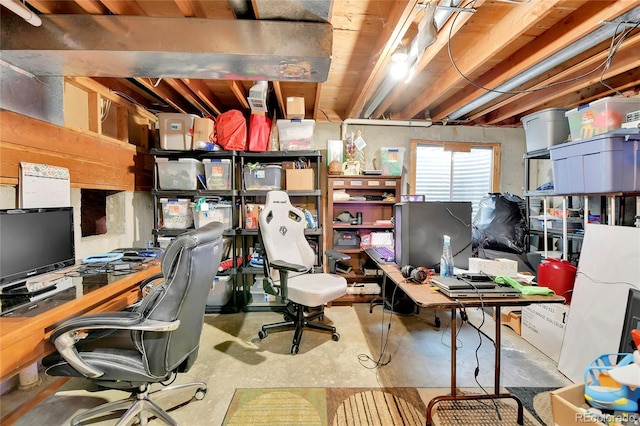 home office featuring concrete floors