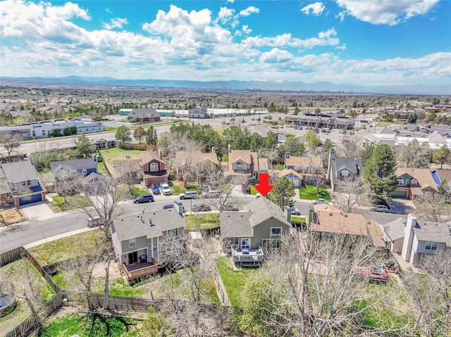 bird's eye view featuring a residential view and a mountain view