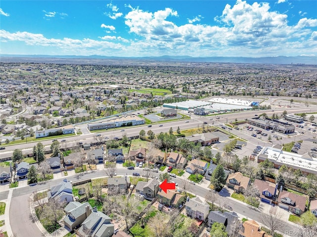 birds eye view of property featuring a mountain view and a residential view