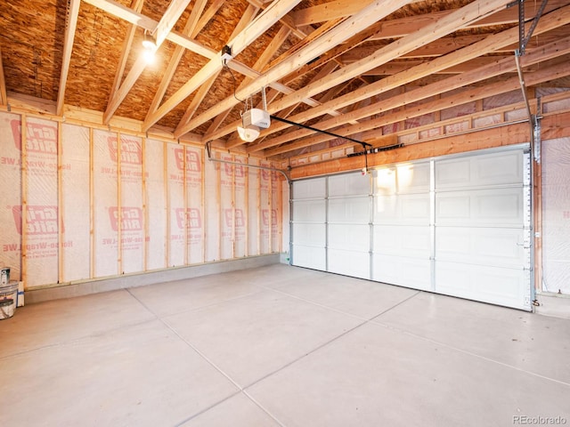 3630 Magnolia St, Denver, CO 80207 - garage featuring a garage door opener