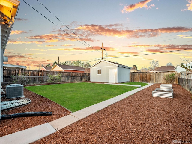3630 Magnolia St, Denver, CO 80207 - yard at dusk with cooling unit and an outbuilding