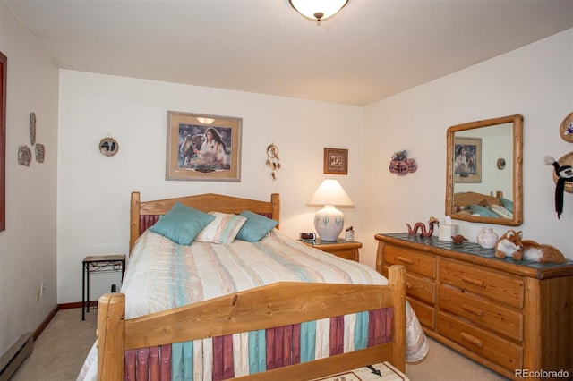 324 W Main St, Frisco, CO 80443 - bedroom with baseboard heating, light colored carpet, and baseboards