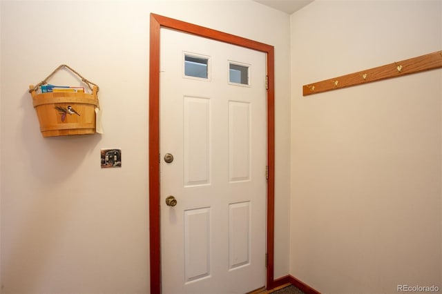 324 W Main St, Frisco, CO 80443 - doorway to outside featuring baseboards