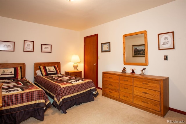 324 W Main St, Frisco, CO 80443 - bedroom featuring light carpet and baseboards