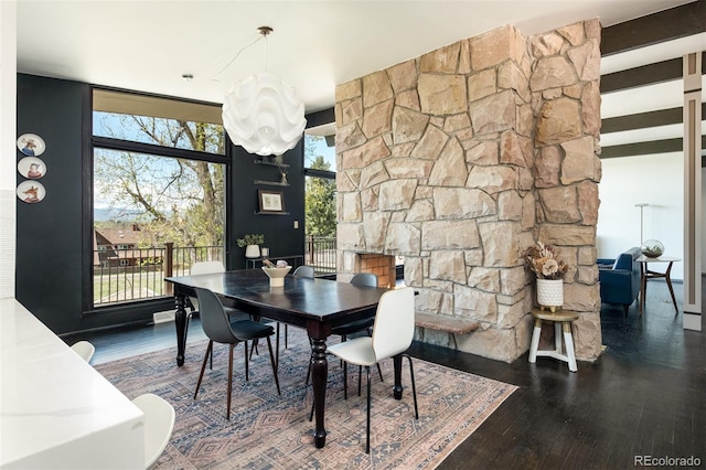 dining space featuring wood-type flooring