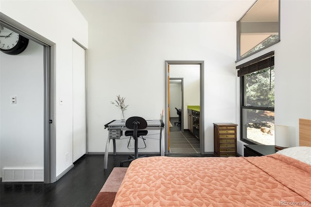 bedroom with wood finished floors